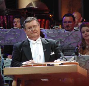 Freditic Jenniges, zither, Andre rieu translations.com